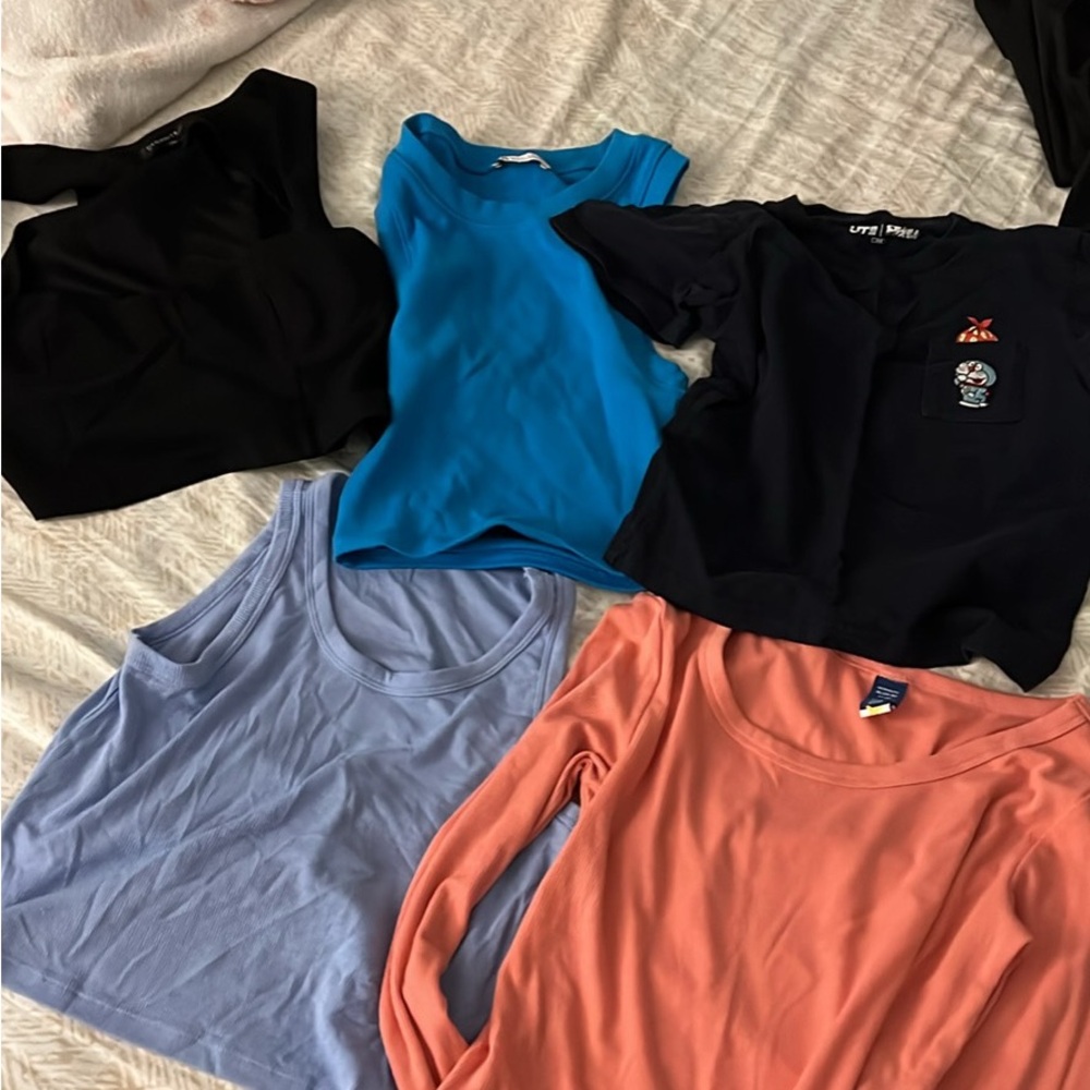 Assorted Tops in Black, Blue, and Coral